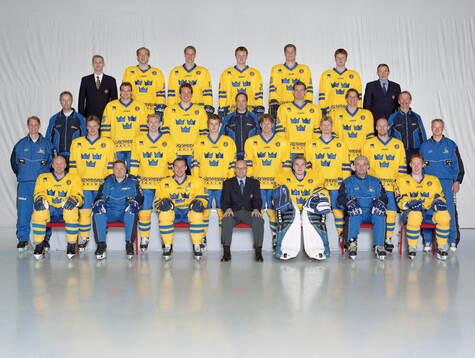Players and team staff of Sweden pose for a team photo