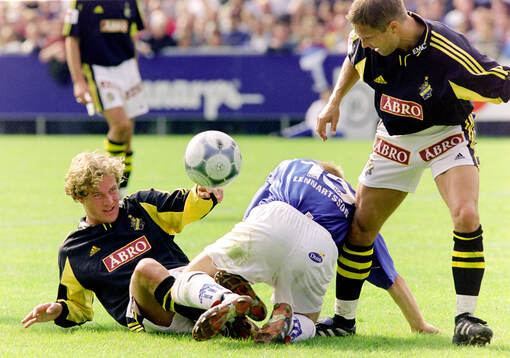 AIK:s Daniel Tjernström (t v) och Ola Andersson mot
