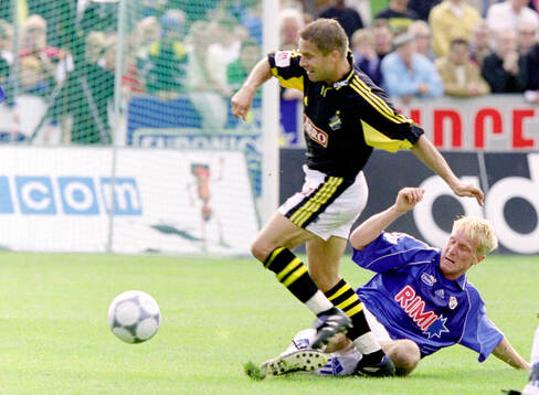 AIK:s Ola Andersson mot Halmstads Petter Hansson