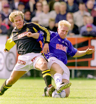 AIK:s Daniel Tjernström mot Halmstads Petter Hansson