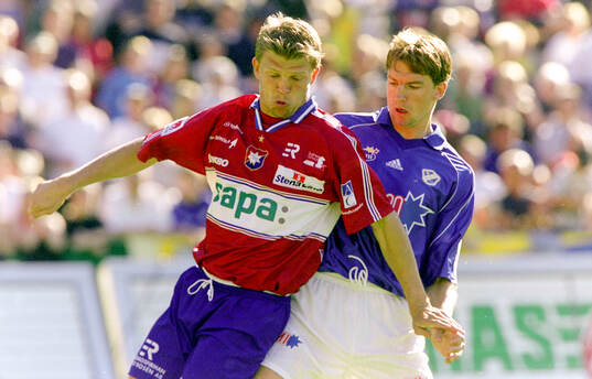 Örgrytes Marcus Allbäck mot Halmstads Mikael Rosén