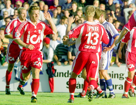 Göteborgs Tomas Rosenkvist jublar och gratuleras