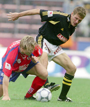 Helsingborgs Björn Johansen mot AIK:s Michael Brundin