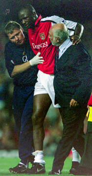 Arsenals Patrick Vieira walks off the pitch because of
