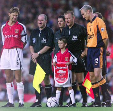 Arsenal captain Tony Adams and Liverpool captain Sami