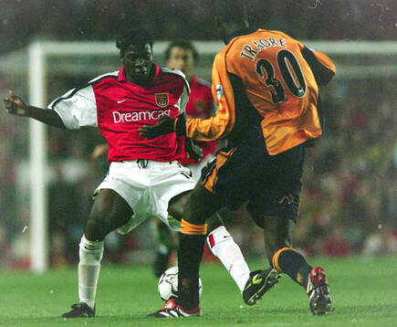 Arsenals Lauren Etame Mayer against Liverpool Djimi Traore