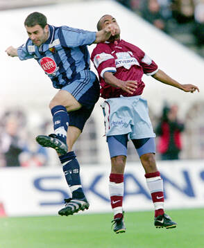Djurgårdens Pierre Gallo mot Malmös Jimmy Tamandi i en