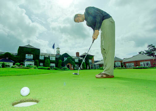 Olof Mellberg of Aston Villa playing golf