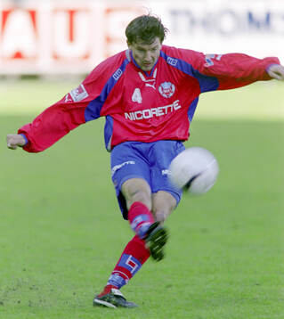 Helsingborgs Mikael Gustavsson skjuter