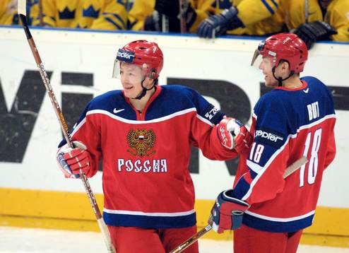 Dmitri Krasotkin och målskytten Anton But
