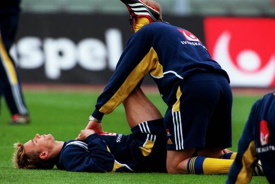 Fotboll, träning, stretching