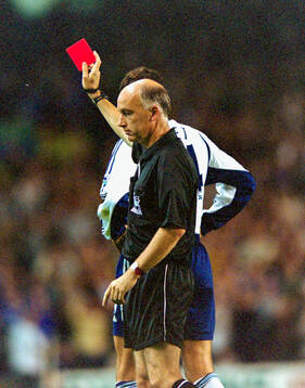 Referee David Elleray showing the red card