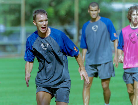 Patrik Andersson of Barcelona. In background Rivaldo and