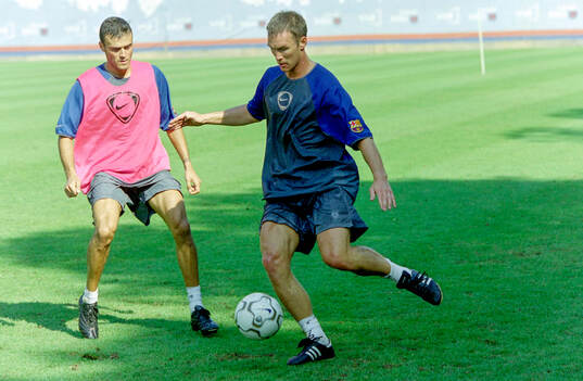 Patrik Andersson and Luis Enrique of Barcelona