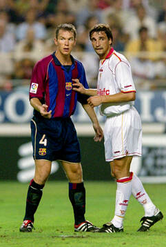 Patrik Andersson of Barcelona, Zoran Njegus of Sevilla
