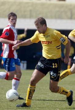 Hans Berggren med fd AIK:aren Thomas Lagerlöf i bakgrunden