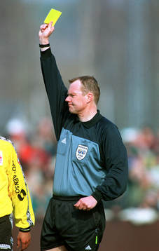 Domare, Karl-Erik Nilsson, gult kort, varning