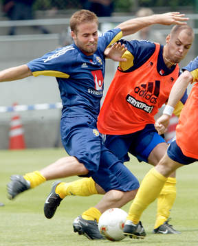 Olof Mellberg och Tomas Antonelius, Sverige, närkamp