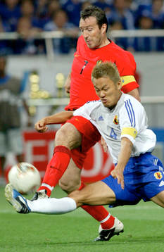 Ryuzo Morioka, Japan och Marc Wilmots, Belgien