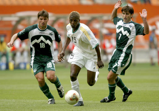 Sibusiso Zuma, Sydafrika och Doni Novak och Amir Karic,