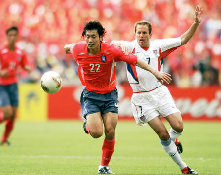 Chong Gug Song, Korea och Eddie Lewis , USA