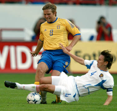 Anders Svensson, Sverige och Alexei Smertin, Ryssland