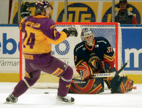 Jonas Frögren, Färjestad och Joaquin Gage, målvakt,