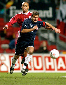 Piotr  Swierczewski, lagkapten, Polen och Thomas Røll