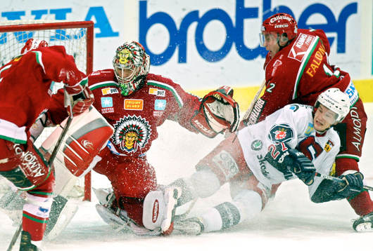 Henrik Lundqvist och Kimmo Eronen, Frölunda och Juha Lind,