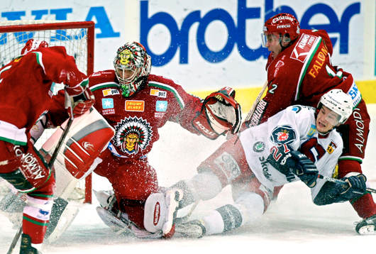 Henrik Lundqvist och Kimmo Eronen, Frölunda och Juha Lind,