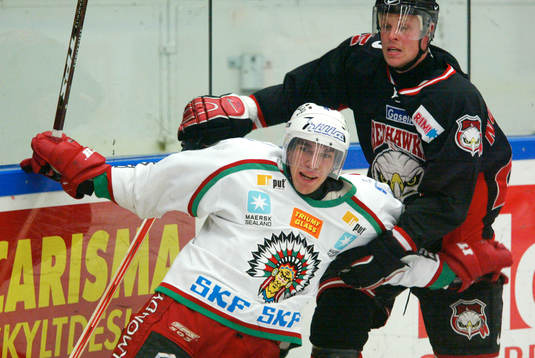 Johan Norgren, Malmö och Frölundas Magnus Johansson