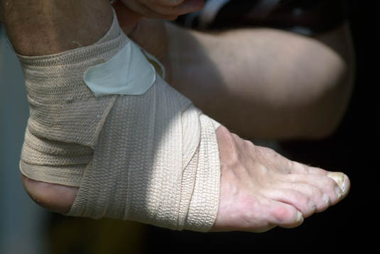 Fotboll,  La Manga, fot, bandage, skada. Bandagerad fot