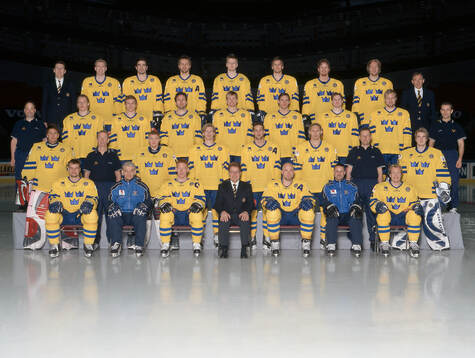Players and team staff of Sweden pose for a team photo