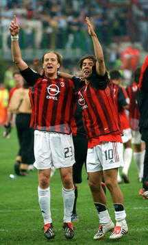 Ambrosini och Rui Costa