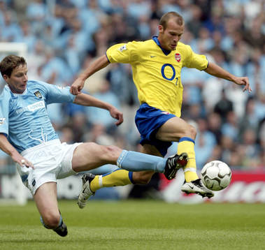 Michael Tarnat, Manchester och Fredrik Ljungberg, Arsenal i