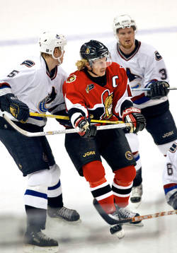 Daniel Alfredsson, Henrik Sedin och Bryan Allen