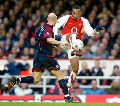 Thierry Henry, Arsenal och  Danny Mills, Middlesbrough