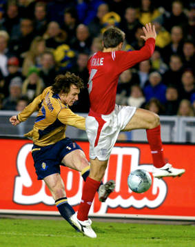 Kim Källström, Sverige och Phil Neville, England