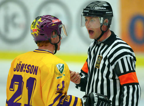 Jörgen Jönsson, Färjestad och Ulf Rönnmark, domare