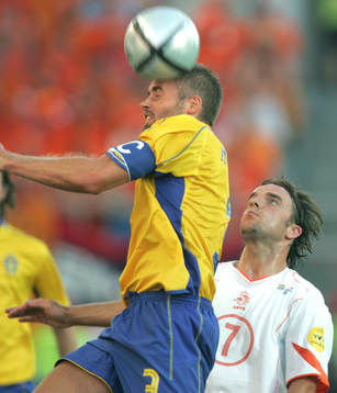 Olof Mellberg och Andy Van Der Meyde. Nick