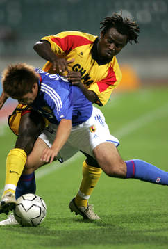 Rasak Pimpong, uganda och Yuichi Komano, Japan