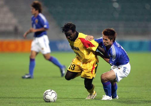 Rasak Pimpong, uganda och Yuichi Komano, Japan