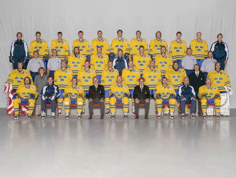 Players and team staff of Sweden pose for a team photo