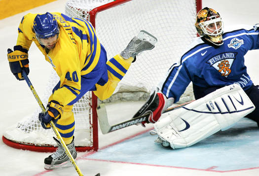 Henrik Zetterberg och Miikka Kiprusoff, målvakt