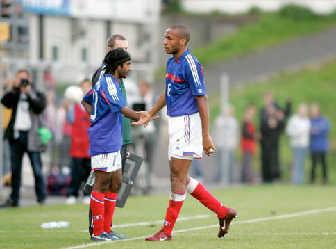 Thierry Henry och Vikash Dhorasoo