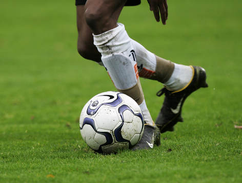Fot, boll, tillslag på bollen, fotbollsskor