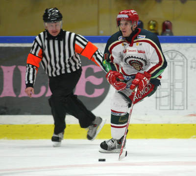Magnus Kahnberg, Frölunda och Robert Lahti, domare