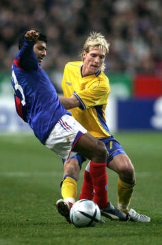 Christian Wilhelmsson, Sverige och Vikash Dhorasoo,