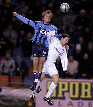 Karii Arnason, Djurgården och Thomas Holm, Vålerenga