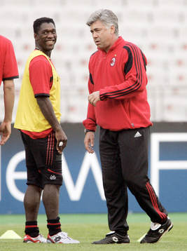 Clarence Seedorf och ; tränare, Carlo Ancelotti